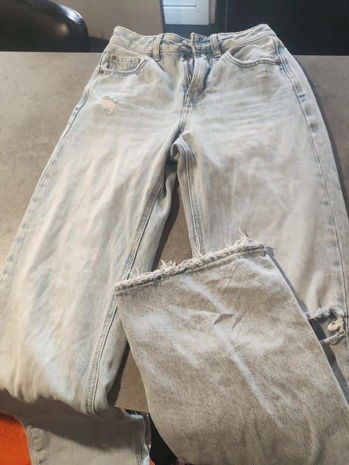 Jean à trous Stradivarius pattes d'éléphant bleu clair taille 32 - photo numéro 4