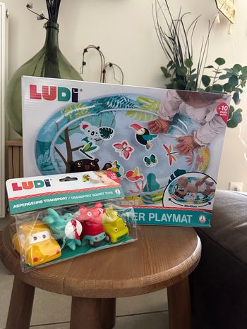 Lot LUDI bébé – tapis d’eau + jouets de bain
