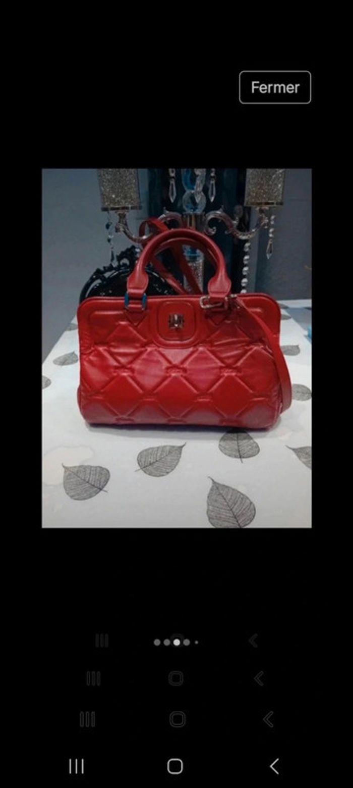 Sac longchamp bandoulière avec quelques petites imperfections voir les photos