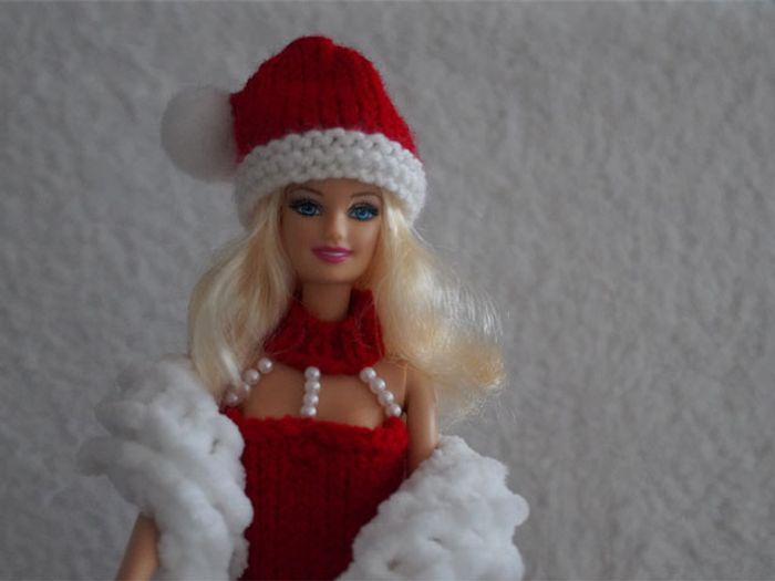 Barbie Noël et son sac de cadeau (avec un vrai cadeau pour Barbie) - photo numéro 4