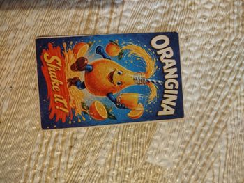 Plaque publicitaire motif orangina neuf