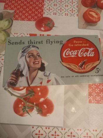 Plaque en métal Coca-Cola aviatrice