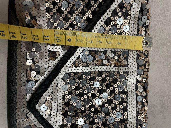 Très belle, pochette argentée et doré. Idéal pour fêtes de fin d’année. - photo numéro 4