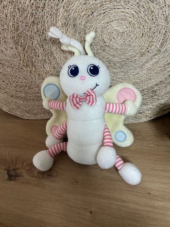 Doudou papillon phosphorescent rose jaune luminou