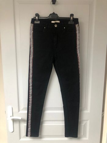Jean noir femme taille38 détaille léopard sur les côtés