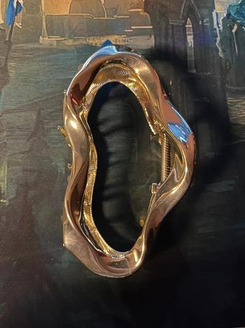 Pince à cheveux dorée - neuf