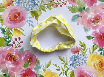 Clarins – Mignon bandeau jaune aux marguerites
