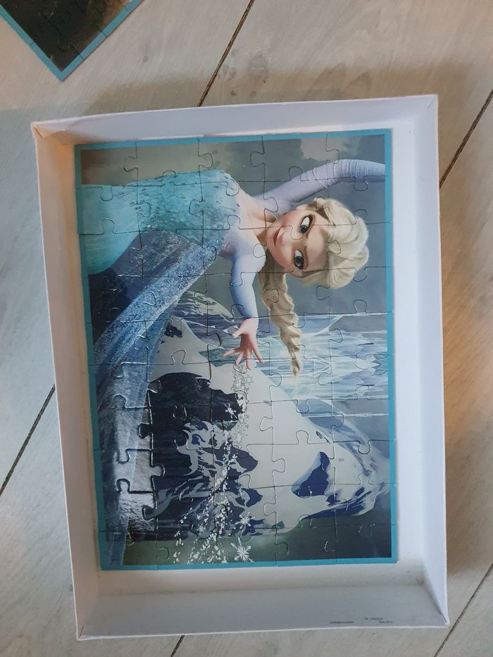 Multi puzzle la reine des neiges - photo numéro 3
