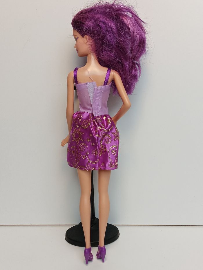 Poupée mattel barbie tenue total mauve
Poupée et ensemble compris - photo numéro 5