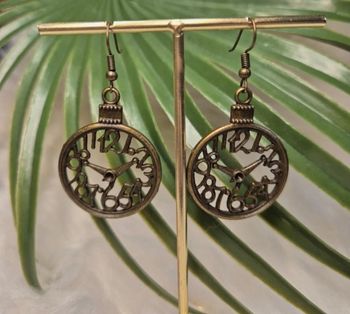 Boucles d’oreilles horloge en métal bronze