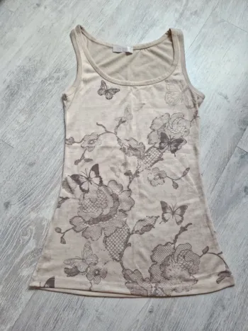 Débardeur Promod avec papillons neuf étiquette de taille coupée mais convient à un XS