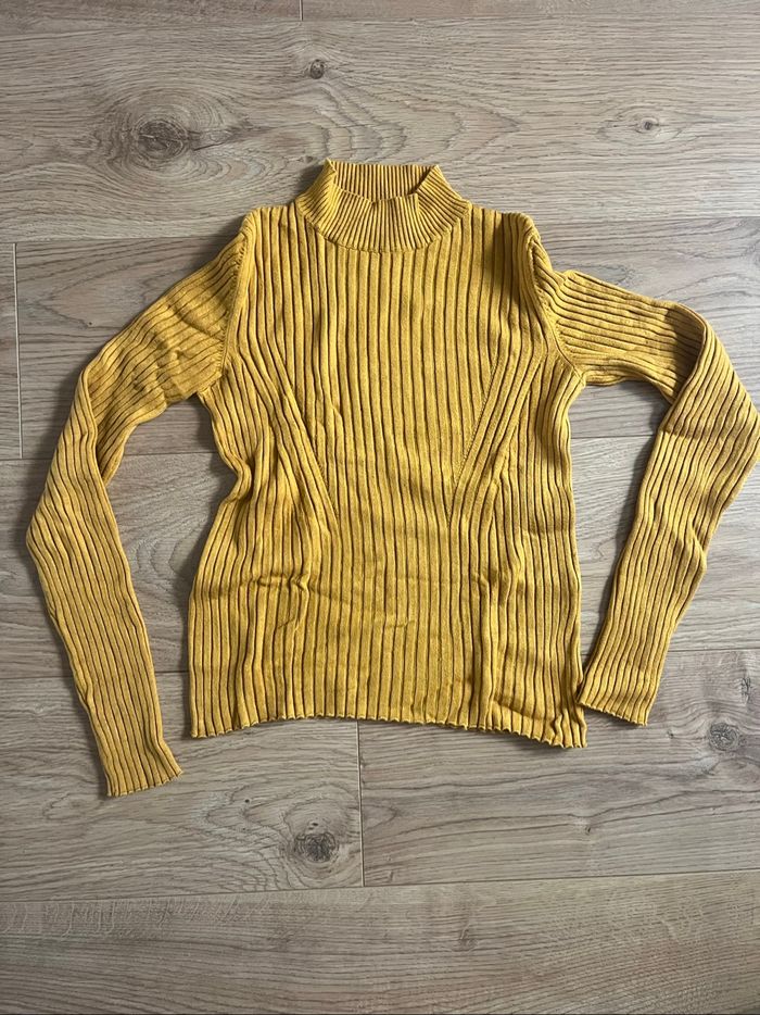 Pull col roulé