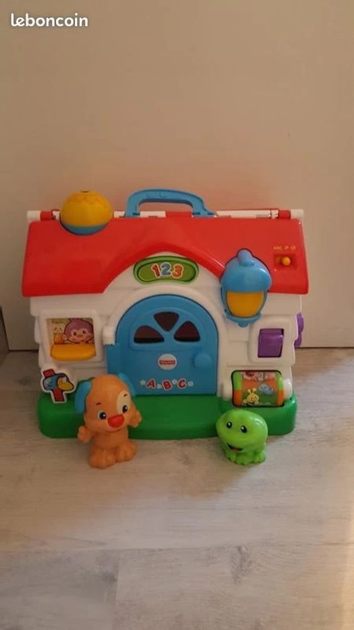 Maison musicale de Puppy Fisher Price avec chien et grenouille