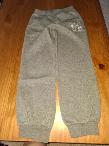 Jogging gris clair Décathlon 8 ans