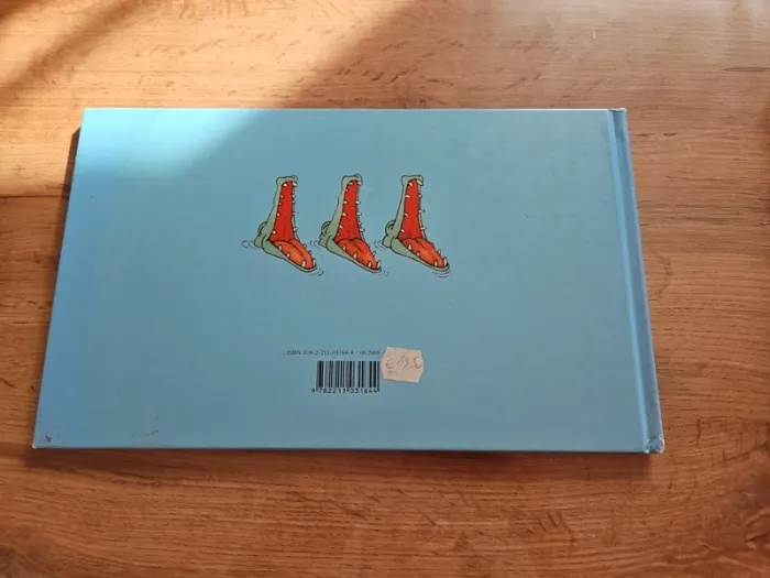 Livre l'ogre, le loup ,la petite fille et le gâteau - photo numéro 2