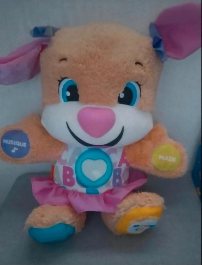 Peluche interactive bébé