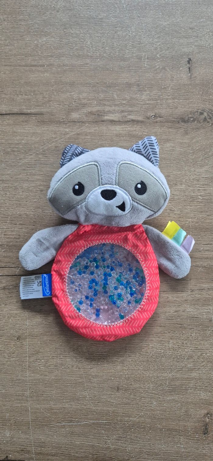 Doudou sensoriel raton laveur