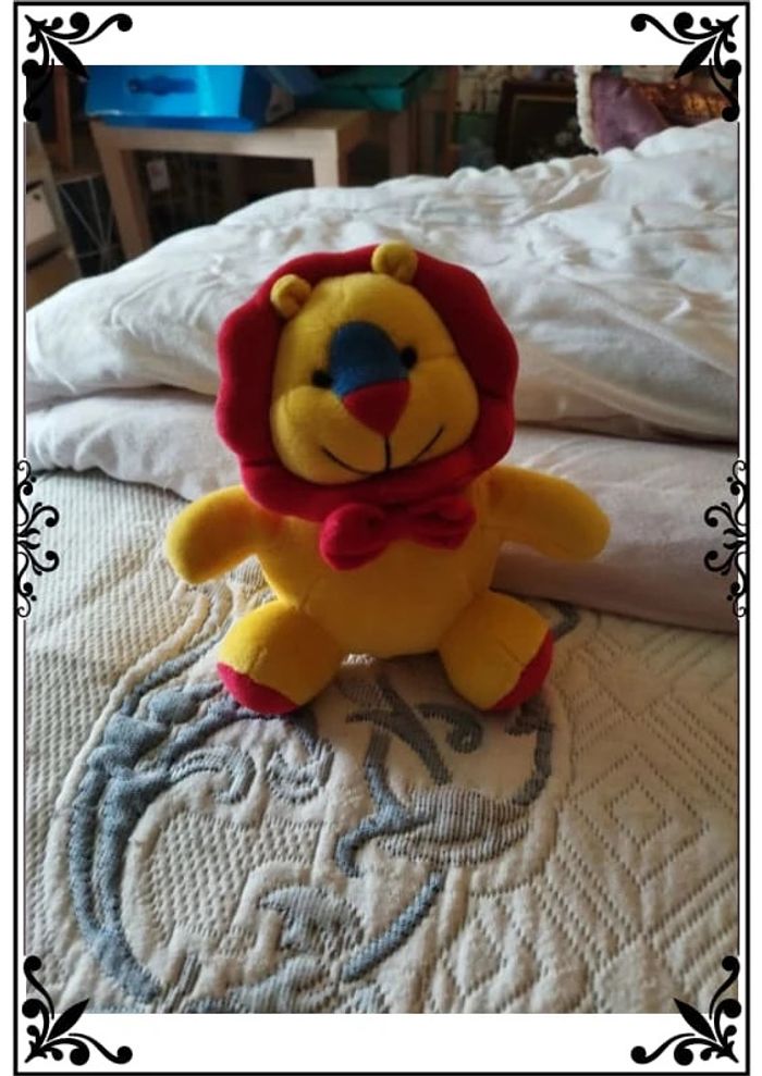 Mini peluche lion rouge et jaune