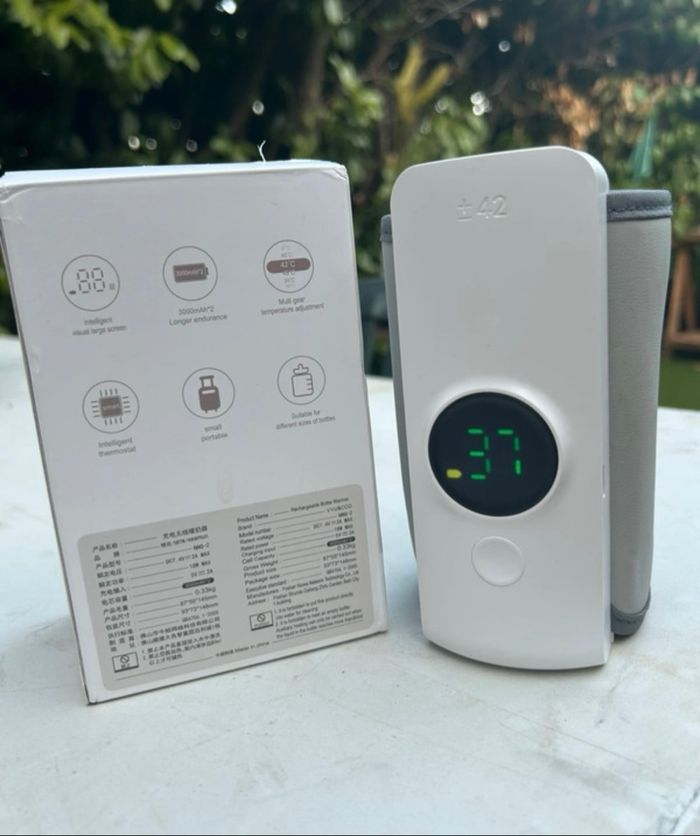 Chauffe biberon Neuf avec boite - chargeur - notice - photo numéro 2