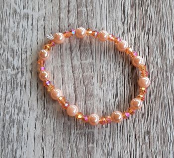 Bracelet en perles orange et nacré