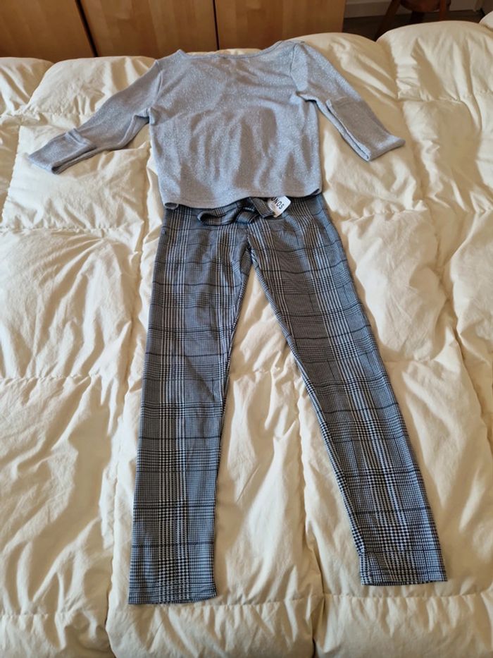 Pantalon neuf et pull.