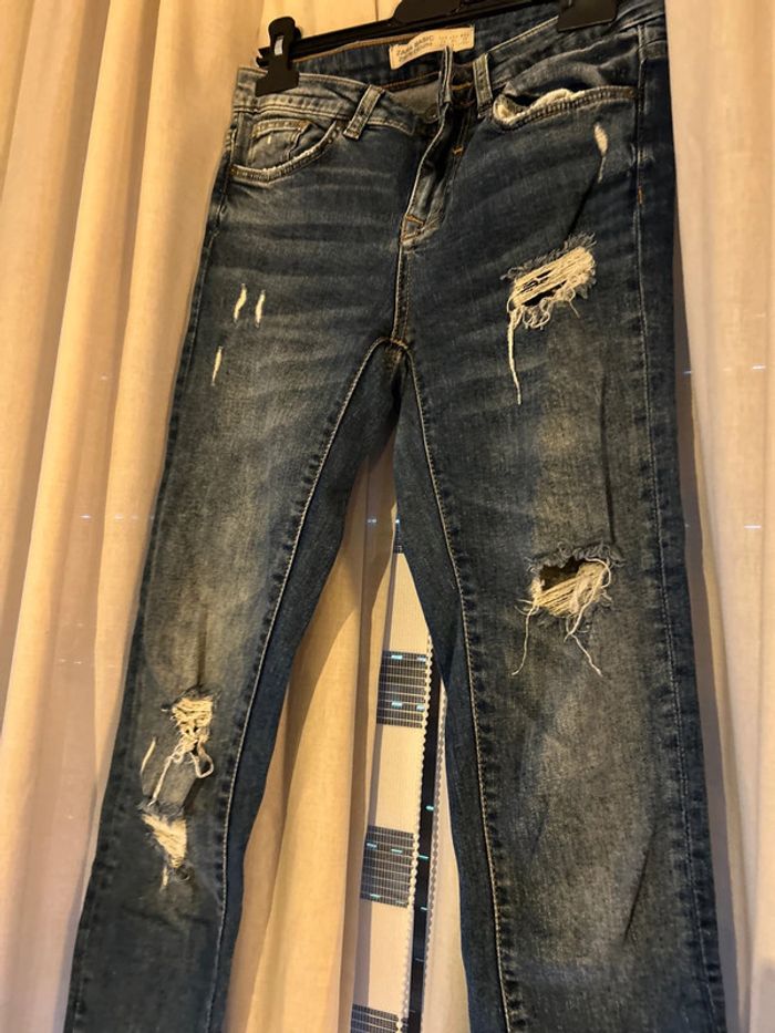 Jeans trouée - photo numéro 3