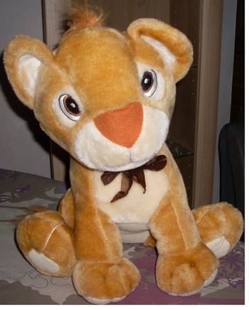 peluche "lion" environ 35 cm en tbe