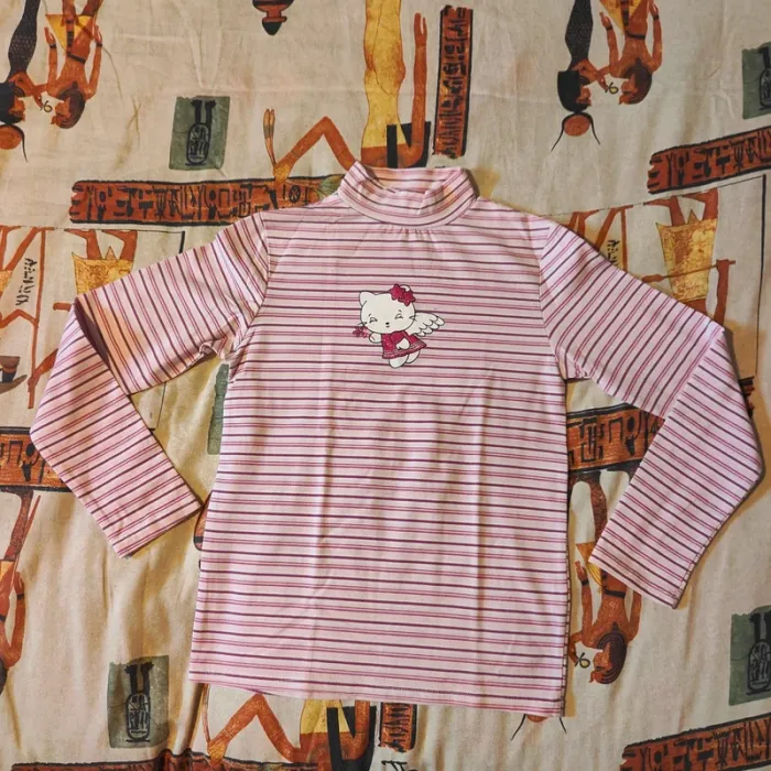 Pull style "Hello Kitty" taille 10 ans