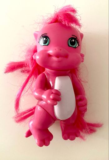 Poupée dragon rose bon état