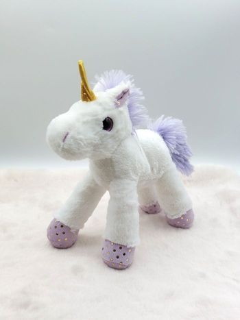 Peluche doudou licorne blanc mauve point or corne dorée yeux violet ZDT ACTION ?