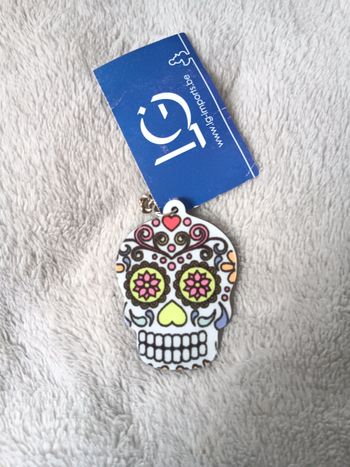 Porte clef tete de mort mexicaine yeux vert rose