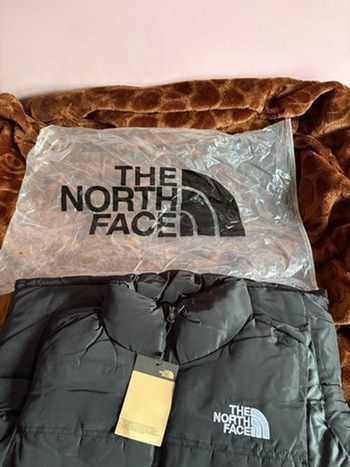 Doudoune the north face sans manches 