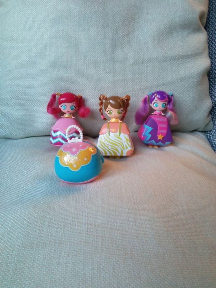 Lot de 4 petites poupées transformables en sac à main