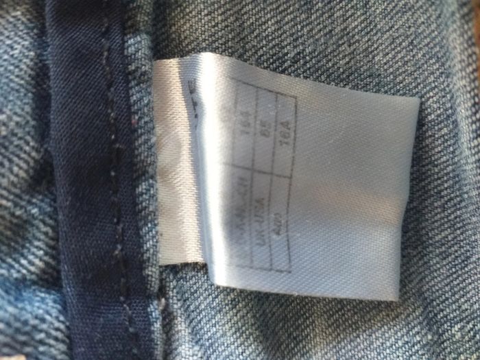 Jeans bleu effet troué - photo numéro 6