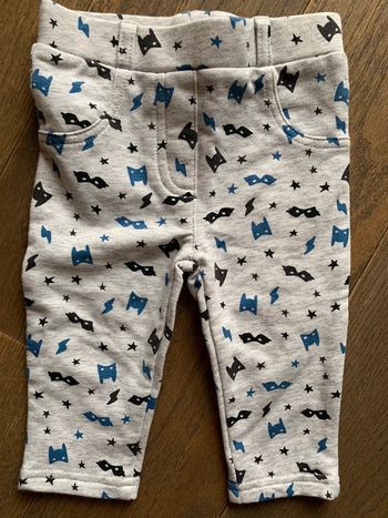 Jogging gris imprimé tex 6 mois tbe