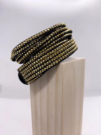 Bracelet noir et doré NEUF