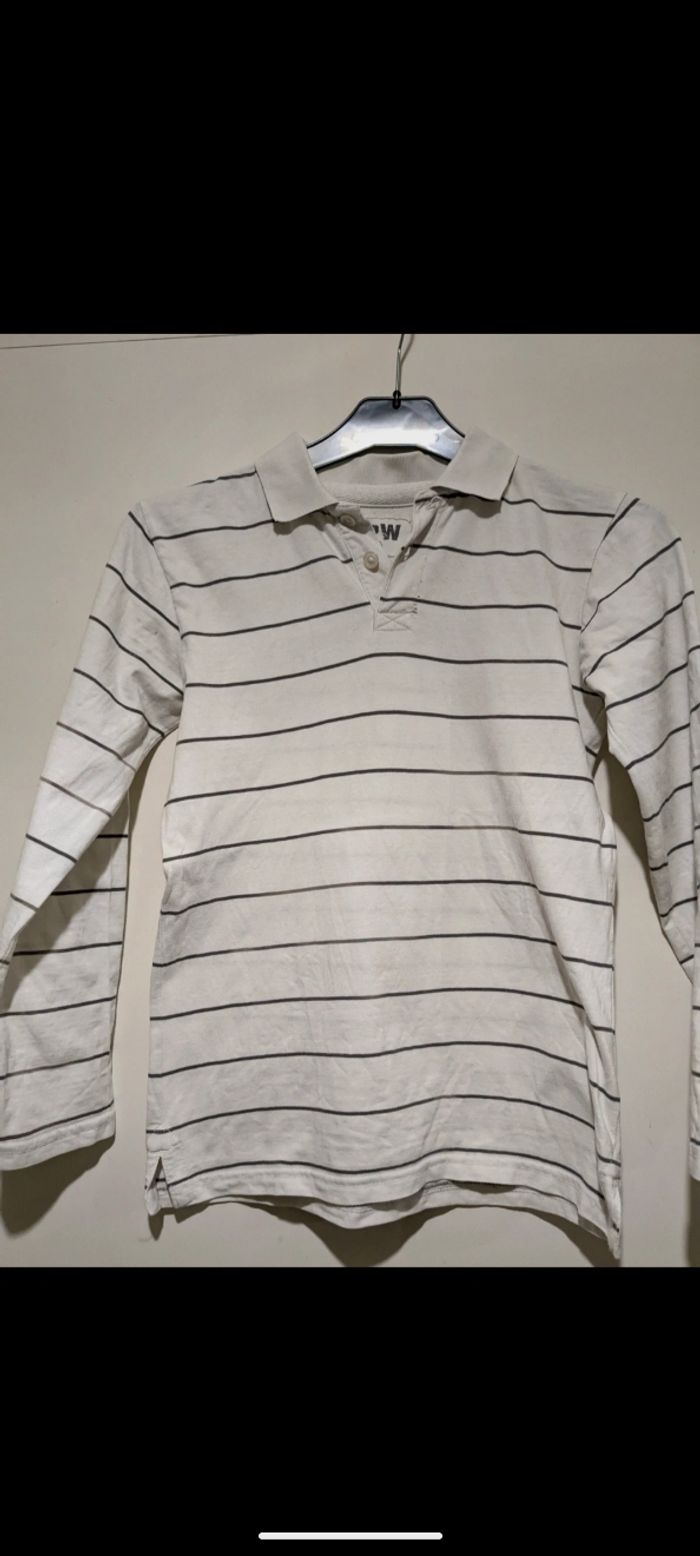 Polo HPW blanc à rayures. Taille 12 ans.