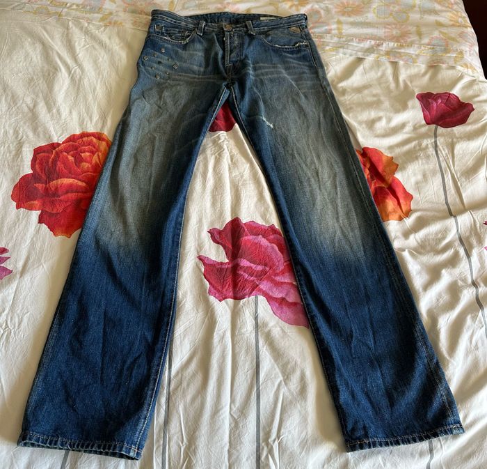 Jean bleu délavé et troué homme Replay - Taille 31x34.