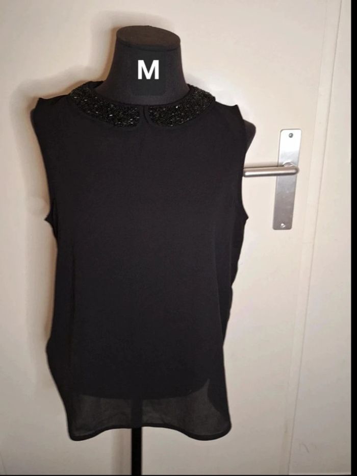 Chemise sans manches pour femme taille M Marque Kiabi très bon état