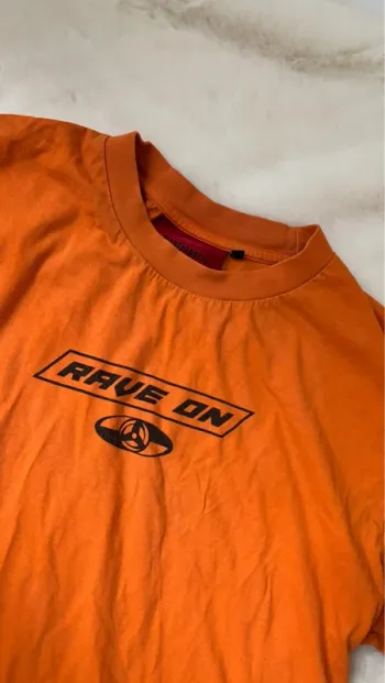 Tee shirt oversize orange Wasted Paris rave on unisexe