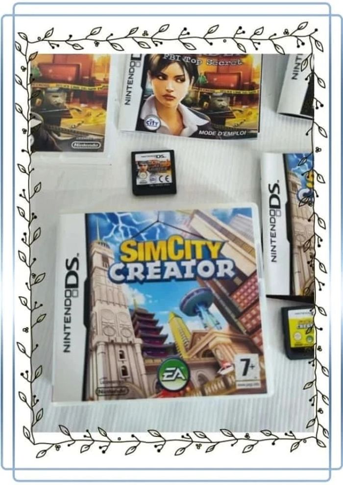 Lot nintendo ds avec une nintendo blanche en bon état mais il y'a des traces + 3 jeux - photo numéro 2
