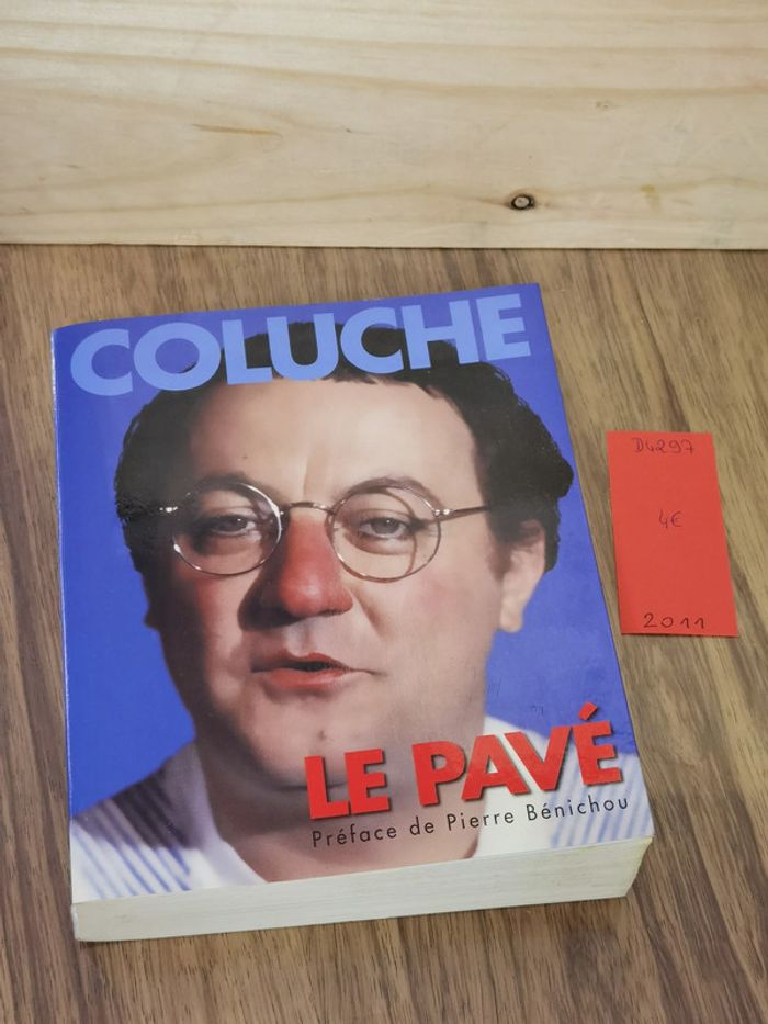 D4297 - livre " Coluche" le pavé