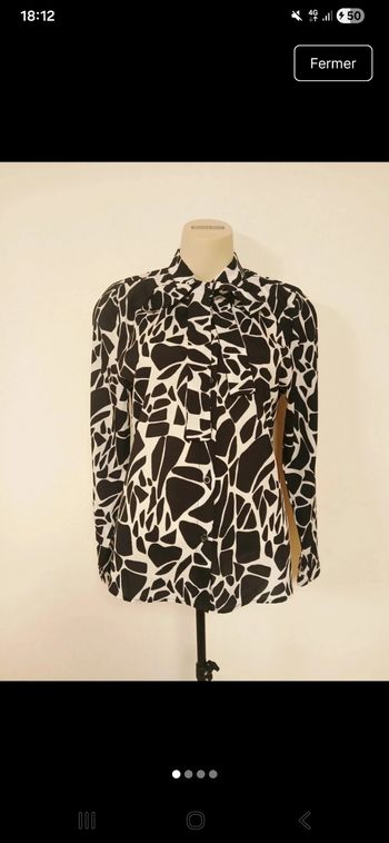 Magnifique chemisier noir et blanc nœud au col 