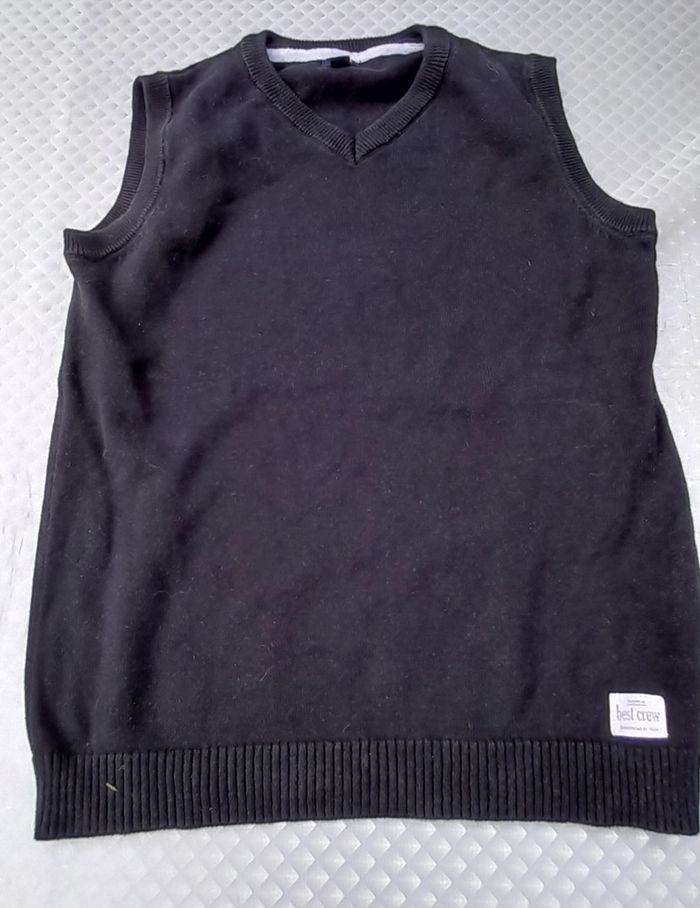 Pull sans manche noir 10 ans