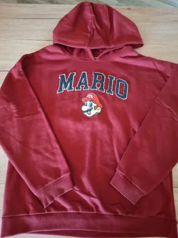 Pull Mario kiabi 12 ans