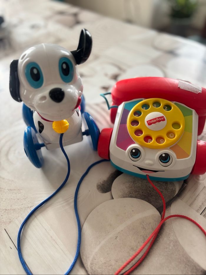 2 jouets à tirer bb