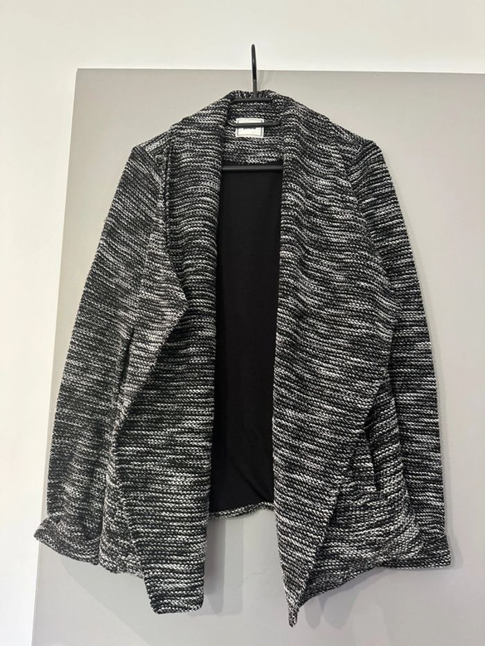 Petite veste noir et blanche taille L pimkie