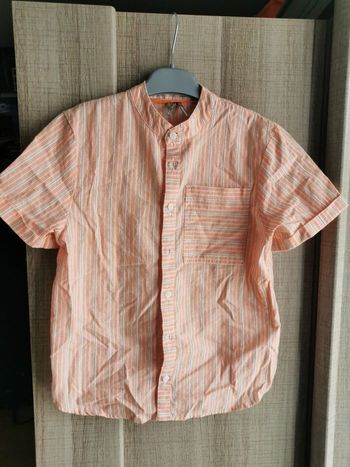 Chemisette garçon, 8 ans.