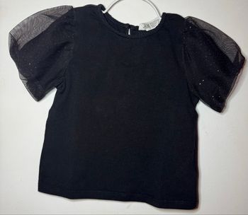 T-shirt noir manches bouffantes en tulles à paillettes argentées H&M