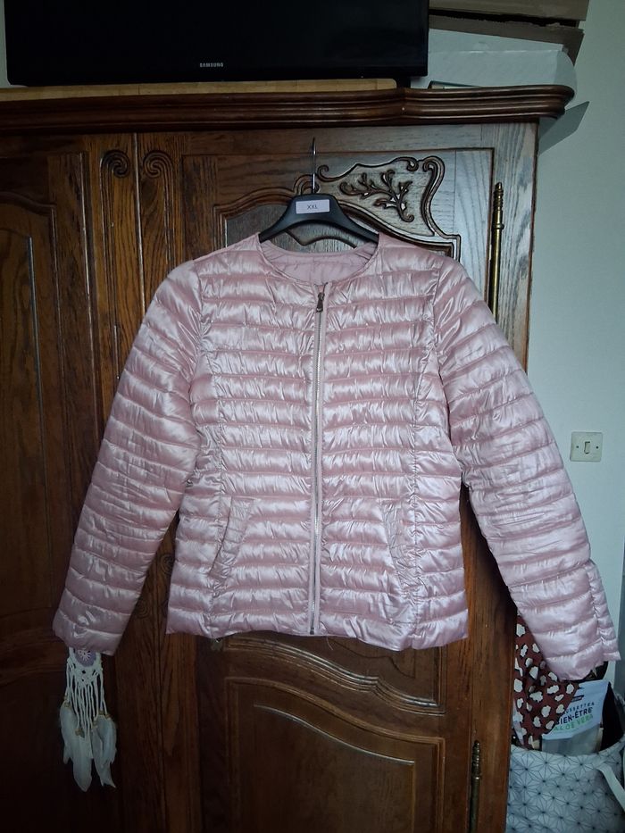 Doudoune marque colynn taille 38 rose brillant